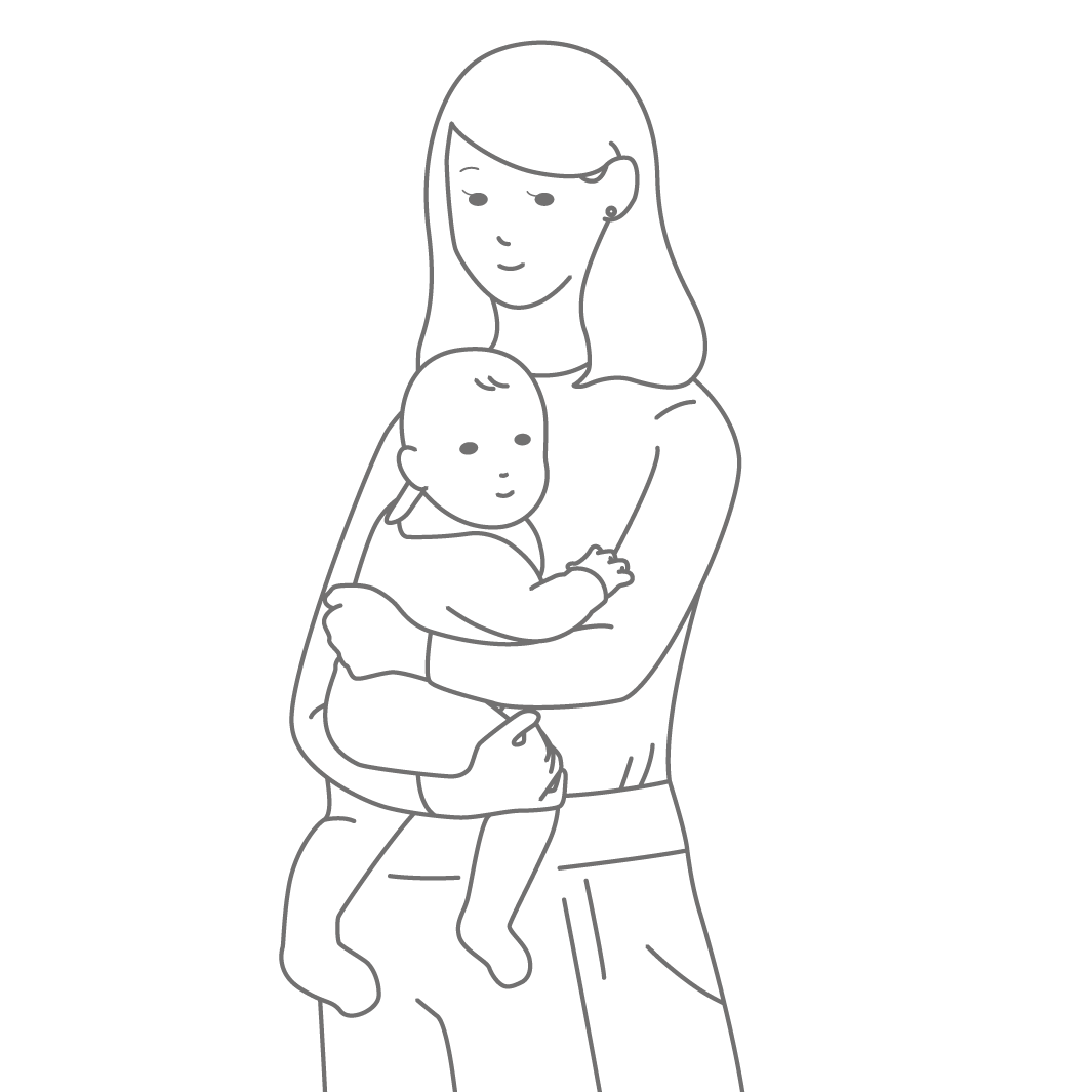 女性が微笑みながら赤ちゃんを抱っこしている